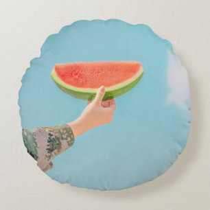 Person holding sliced watermelon round cushion