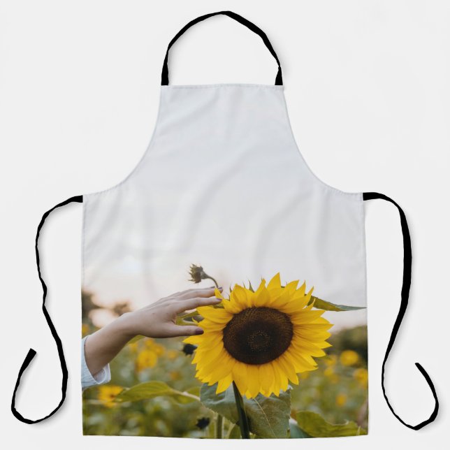 Person holding sunflower apron (Front)