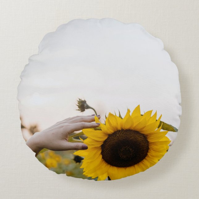 Person holding sunflower round cushion (Front)