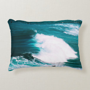 Person on surfboard with ocean waves decorative cushion
