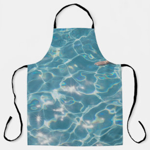 Person on swimming pool apron