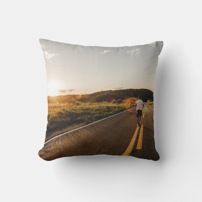 Person running in road in the morning cushion (Front)