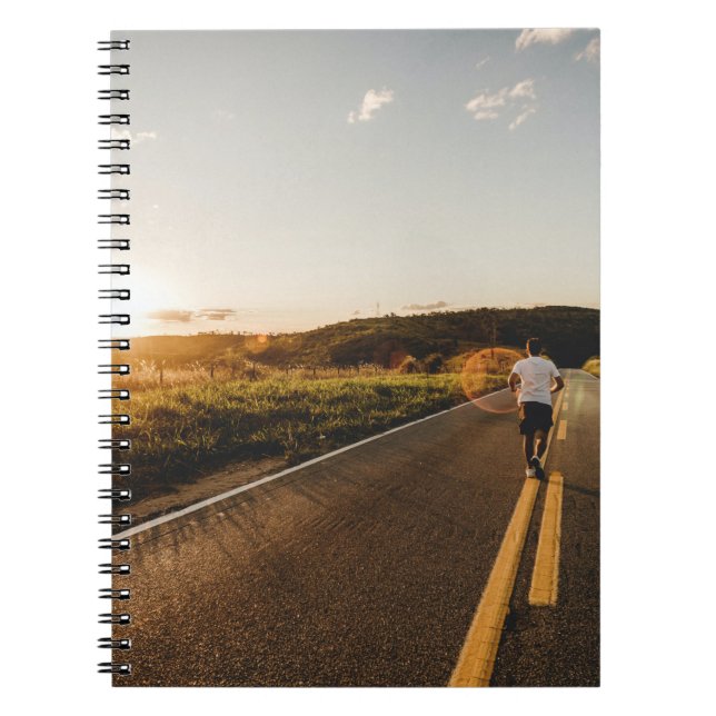 Person running in road in the morning notebook (Front)