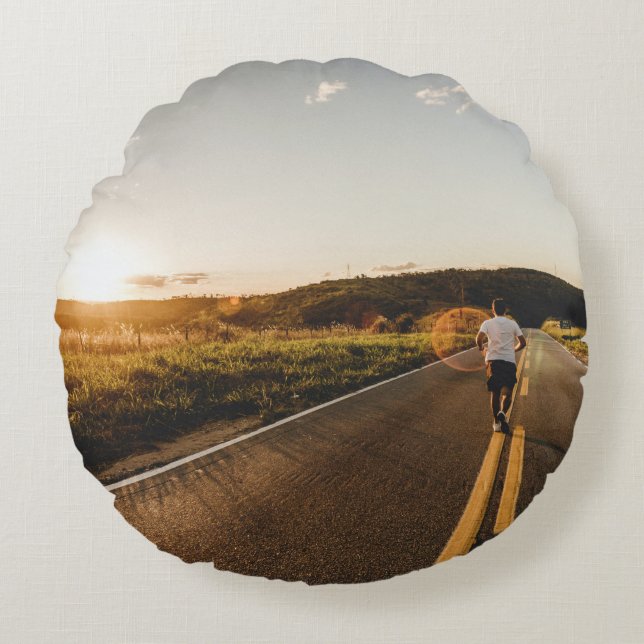 Person running in road in the morning round cushion (Front)