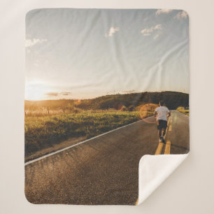 Person running in road in the morning sherpa blanket