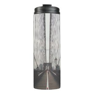 PERSON RUNNING ON BRIDGE THERMAL TUMBLER