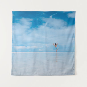 Person standing in body of water tapestry