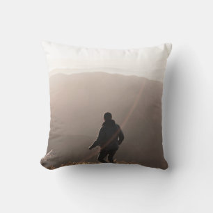 Person standing on rock cushion