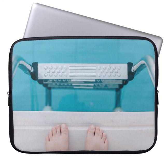 Person standing on swimming pool ladder laptop sleeve (Front)