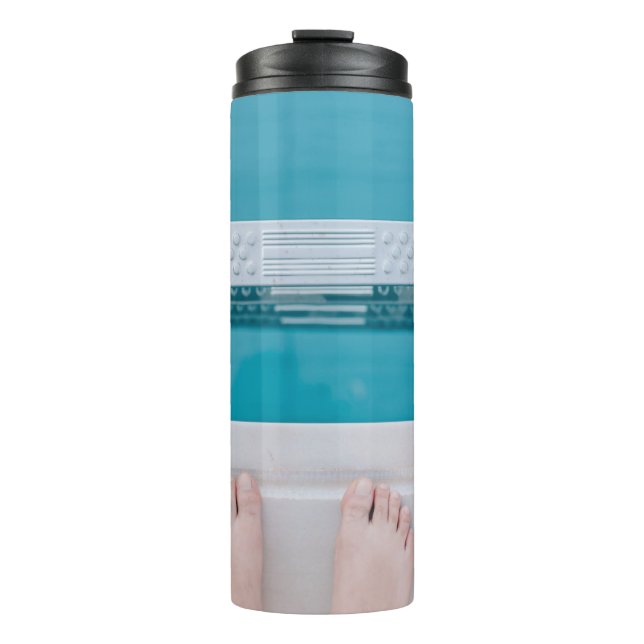 Person standing on swimming pool ladder thermal tumbler (Front)