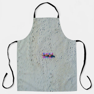 Person sunbathing at the beach apron