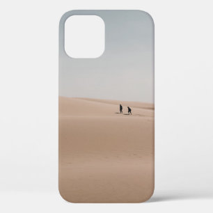 PERSON WALKING ON BROWN SAND DURING DAYTIME iPhone 12 CASE