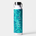 Personalise Vertical Name White Script, Teal Water Water Bottle<br><div class="desc">Personalise your name in vertical white script text on teal water background.</div>