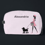 Personalise Woman in pink walking black poodle  Dopp Kit<br><div class="desc">Personalise this woman in pink with a beret walking a black poodle and add a name.</div>