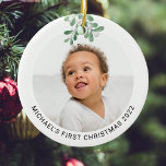 Personalised Baby's First Christmas Photo  Ceramic Ceramic Ornament<br><div class="desc">This modern First Christmas Ornament is decorated with watercolor mistletoe.
Easily customisable with your photo,  name,  and year.
Use the Design Tool to change the text size,  style,  or colour.
Because we create our artwork you won't find this exact image from other designers.
Original Watercolor © Michele Davies.</div>