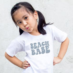 Personalised Beach Babe Flower Girl Bridal Party T-Shirt<br><div class="desc">Looking for a fun and funky way to dress your beach bridal party? Look no further than these dusty blue boho beach babe flower girl shirts! With a disco vibe, they'll have everyone dancing the night away. Plus, they're perfect for keeping cool on hot days. So why wait? Order yours...</div>