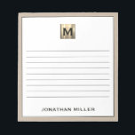 Personalised Beige Linen Gold Monogram Notepad<br><div class="desc">Stay organised in style with this personalised beige linen notepad featuring a sophisticated black and gold monogram design. The lined pages provide ample space for jotting down notes, to-do lists, and more, while the elegant design adds a touch of luxury to your everyday life. Perfect for personal use or as...</div>