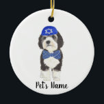 Personalised Bernedoodle Blue Yarmulke Bow Tie Ceramic Ornament<br><div class="desc">I am in love with this beautifully detailed watercolor illustration of a grey, black, and white bernedoodle or sheepadoodle on an ornament with a sweet little blue and white yarmulke and bowtie combo! Personalise these ornaments and make the nice list this year! For the perfect presents, pair it with a...</div>