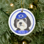 Personalised Bernedoodle Hanukkah Yarmulke Blue Ceramic Ornament<br><div class="desc">Celebrate your favourite mensch on a bench with personalised ornament! This design features a sweet illustration of a bernedoodle or sheepadoodle dog with a blue and white yarmulke. For the most thoughtful gifts, pair it with another item from my collection! To see more work and learn about this artist, visit...</div>