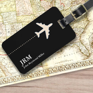 personalised black and white travel aeroplane luggage tag