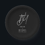 Personalised Black and White Wedding Paper Plate<br><div class="desc">Add a touch of elegance to your wedding reception with these personalised paper plates. Featuring a large brushed script two initial monogram with the couple's name and wedding date below in modern sans serif font, this design is perfect for a sophisticated and stylish celebration. The white text on a black...</div>