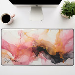 Personalised Black Pink Gold Liquid Alcohol Ink Desk Mat<br><div class="desc">Unveiling our Personalised Black, Pink, and Gold Liquid Waves Mat. This captivating design showcases an abstract pattern of fluid waves in an elegant harmony of black, pink, and gold tones. The striking contrast creates a luxurious feel, while the personalised feature adds a unique touch to this design. This radiant piece...</div>