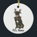 Personalised Black Pitbull Staffy Antlers Wreath Ceramic Ornament<br><div class="desc">Make the nice list this year with an ornament of your favourite pitbull elf! For the sweetest gifts, pair it with a matching art print or another item from my collection for a thoughtful housewarming, bridal shower, teacher, mother-in-law, husband, boyfriend, secret santa, sympathy, or tough-to-shop-for gift! To see more work...</div>