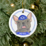 Personalised Blue Grey Frenchie Hanukkah Ceramic Ornament<br><div class="desc">Celebrate your favourite mensch on a bench with personalised ornament! This design features a sweet illustration of a blue grey french bulldog or frenchie dog with a blue and white yarmulke. For the most thoughtful gifts, pair it with another item from my collection! To see more work and learn about...</div>