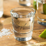 Personalised Bride Shot Glass<br><div class="desc">Welcome to our collection of personalised bride products on Zazzle! Here,  we specialise in creating unique and customisable items to celebrate the journey of becoming a bride. Whether you're planning your dream wedding or looking for the perfect bridal shower gifts,  we've got you covered.</div>