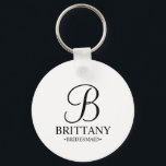Personalised Bridesmaid's Name and Monogram Key Ring<br><div class="desc">Elegant Personalised Bridesmaid Gifts
featuring personalised monogram in black elegant script font style with bridesmaid's name and title in classic serif font style on white background.

Also perfect for groomsmen,  best man,  father of the bride,  maid of honour,  flower girl,  mother of the bride and more.</div>