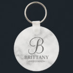 Personalised Bridesmaid's Name and Monogram Key Ring<br><div class="desc">Elegant Personalised Bridesmaid Gifts featuring personalised monogram in grey elegant script font style with bridesmaid's name and title in classic serif font style on white marble background. Also perfect for groomsmen, best man, father of the bride, maid of honour, flower girl, mother of the bride and more. Please note: The...</div>