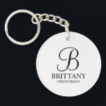 Personalised Bridesmaid's Name and Monogram Key Ring<br><div class="desc">Elegant Personalised Bridesmaid Gifts
featuring personalised monogram in black elegant script font style with bridesmaid's name and title in classic serif font style on white background.

Also perfect for groomsmen,  best man,  father of the bride,  maid of honour,  flower girl,  mother of the bride and more.</div>
