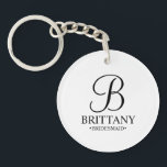 Personalised Bridesmaid's Name and Monogram Key Ring<br><div class="desc">Elegant Personalised Bridesmaid Gifts
featuring personalised monogram in black elegant script font style with bridesmaid's name and title in classic serif font style on white background.

Also perfect for groomsmen,  best man,  father of the bride,  maid of honour,  flower girl,  mother of the bride and more.</div>
