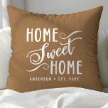 Personalised Brown Home Sweet Home Cushion<br><div class="desc">Bring warmth and charm to your home with this personalised brown "Home Sweet Home" throw pillow. The elegant script and customisable family name create a welcoming touch for your living room or bedroom. The neutral colour palette complements various home décor styles.</div>