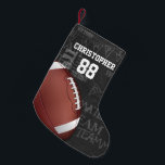 Personalised Chalkboard American Football Small Christmas Stocking<br><div class="desc">A modern American football grid iron design featuring a football on a chalkboard typography background with football terminology in the background. The design features customisable text for the name and number of the football player or grid iron fan. This design has been made in part with graphics licensed by Graphics...</div>
