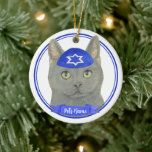 Personalised Chartreux Cat Yarmulke Blue White Ceramic Ornament<br><div class="desc">Celebrate your favourite mensch on a bench with personalised ornament! This design features a sweet illustration of a grey chartreux cat with a blue and white yarmulke. For the most thoughtful gifts, pair it with another item from my collection! To see more work and learn about this artist, visit her...</div>
