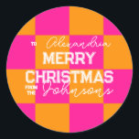 Personalised Christmas Check Hot Pink Orange Classic Round Sticker<br><div class="desc">This is a bright Christmas design in trending orange and hot pink and check pattern. It has the message, "To Alexandria Merry Christmas! from the Johnsons". Ideal for your Christmas gift wrap, mailing accessories. envelope seals, and party favour seals this festive season. To personalise, simply add your names by using...</div>