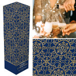 Personalised Christmas Snowflake Blue Gold Gift Wine Box<br><div class="desc">Add the wow factor to your bottle of wine or Champagne with a personalised gift box! This elegant winter-themed design features the words 'Merry Christmas' and can be personalised with the recipient's name or a family name and the holiday year. A stylish all-over pattern adorned with interconnected flower shapes, heart-shaped...</div>