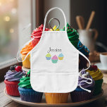 Personalised cupcake baking apron for children<br><div class="desc">Personalised cupcake baking apron for children. In beige, yellow or white. Funny baker gift for little kids and cupcake lovers. Girlie girl design with elegant script text. Colourful image with pastel colours pink blue green etc. Fun birthday party idea.</div>