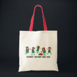 Personalised Funny Face Photo Christmas Elf Tote Bag<br><div class="desc">Get into the festive spirit with our Family and Friends Custom Elf Face Matching T-shirts for Christmas! Personalise the T-shirt with adorable elf designs, and add your family’s faces to make it uniquely yours. This shirt is perfect for family photos or holiday gatherings. Ideal for family Christmas parties, group events,...</div>