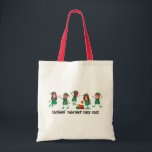 Personalised Funny Face Photo Christmas Elf Tote Bag<br><div class="desc">Get into the festive spirit with our Family and Friends Custom Elf Face Matching T-shirts for Christmas! Personalise the T-shirt with adorable elf designs, and add your family’s faces to make it uniquely yours. This shirt is perfect for family photos or holiday gatherings. Ideal for family Christmas parties, group events,...</div>