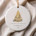 Personalised Gold Christmas Tree Our First Married Ceramic Ornament<br><div class="desc">Commemorate your first Christmas as a married couple with this elegant gold Christmas tree ornament. The minimalist design features a shimmering gold tree, perfect for adding a touch of sophistication to your holiday decor. Personalise it with your names and the year for a beautiful keepsake that will bring festive memories...</div>