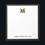 Personalised Gold Monogram Black White Notepad<br><div class="desc">Elevate your stationery game with this monogrammed notepad featuring classic block typography and a brushed gold medallion monogram and black trim. The notepad includes space for your name or custom text, making it perfect for personal or professional use. Use it to jot down notes, ideas, and reminders in style. It...</div>