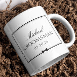 Personalised Groomsman Bowtie Wedding Party Gift Mug<br><div class="desc">Classic, clean, and completely customisable—this black tie groomsman mug makes the perfect gift for your wedding party. Designed with a timeless black-and-white palette, it features a dapper bowtie icon, modern serif fonts, and editable name and date fields. Ideal for bachelor brunches, wedding morning coffee, or as part of a groomsman...</div>