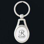 Personalised Groomsman's Name and Monogram Key Ring<br><div class="desc">Elegant Black and White Personalised Groomsman Gifts
featuring personalised monogram in black elegant script font style with groomsman's name and title in classic serif font style on white background.

Also perfect for best man,  father of the bride,  bridesmaid,  maid of honour,  flower girl,  mother of the bride and more.</div>