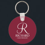 Personalised Groomsman's Name and Monogram Key Ring<br><div class="desc">Elegant Personalised Groomsman Gifts
featuring personalised monogram in white elegant script font style with groomsman's name and title in classic serif font style on burgundy red background.

Also perfect for best man,  father of the bride,  bridesmaid,  maid of honour,  flower girl,  mother of the bride and more.</div>