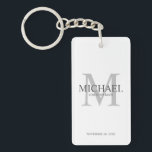 Personalised Groomsmen's name and monogram Key Ring<br><div class="desc">Add a personal touch to your wedding with personalised groomsmen keychain. This keychain features personalised groomsman's name with title and wedding date in grey and monogram in light grey as background, in classic serif font style, on white background. Also perfect for best man, father of the bride, ring bearer and...</div>
