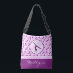 Personalised Gymnastics Purple Heart Floral Crossbody Bag<br><div class="desc">Floral gymnastics gym tote with shades of light and dark purple. The flowers have little hearts in the centre. It also has a gymnast silhouette in a circle. Add your name before you order! You can also use the "customise it" button to pick a different font or colour for the...</div>