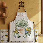 Personalised Italian Watercolor Cooking  Apron<br><div class="desc">Italian-inspired cooking apron featuring a olive-themed graphic. With a playful illustration of olive tree branch, basket of lemons, along with the text in a warm, handwritten-style font. Perfect for anyone who loves traditional Italian cooking, family gatherings, and homemade meals, this towel combines practical kitchen wear with vintage Mediterranean charm. A...</div>
