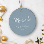 Personalised Married Couple Handwritten Blue Ceramic Ornament<br><div class="desc">Celebrate your first Christmas as a married couple with this personalised boho dusty blue ceramic ornament. Featuring a charming handwritten script, this ornament beautifully displays the names of the bride and groom, along with the year. The earthy blue tone adds a touch of natural elegance, making it a perfect keepsake...</div>